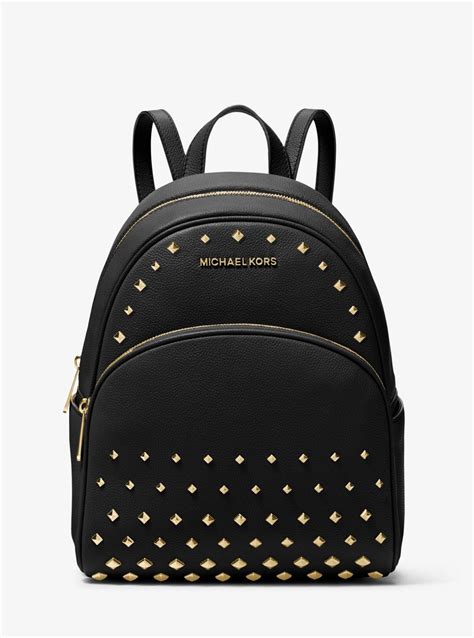 michael michael kors abbey medium pebbled leather backpack|michael kors jet set backpack.